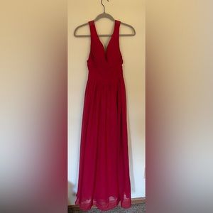 Floor length dark red bridesmaid dress with corset back.